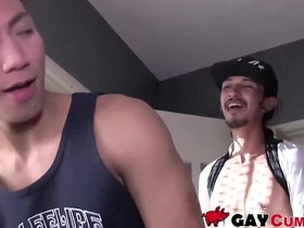 Tattooed Asian guy eagerly gives deepthroat to a hairy cock