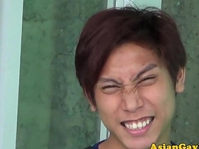 Young Asian twinks engage in watersports and rimming