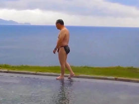 Elderly Asian man enjoys oral attention