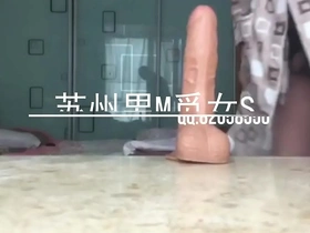 Suzhou male indulges in anal pleasure with a dildo
