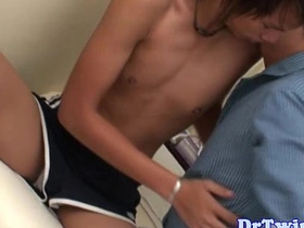 Young Asian doctor gives oral pleasure to his patient